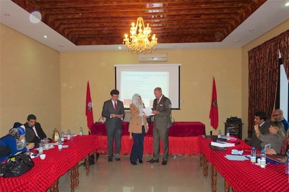 HE Mr. R.G. Strikker, Ambassador of the Kingdom of The Netherlands in Morocco, submitting the course certificate to judge Salma Kerdouss